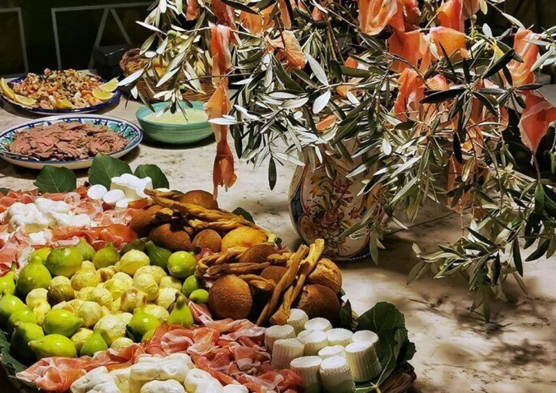 Antipasto platter with prosciutto, mozzarella, figs and bread at Casa Rispo